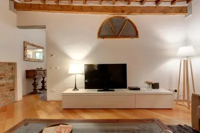 TV o dispositivi per l'intrattenimento presso San Lorenzo Apartment by Mamo Florence