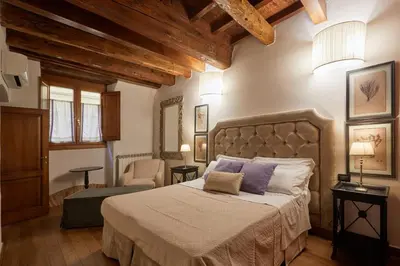 Letto o letti in una camera di La Dimora Fiorentina