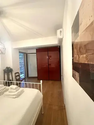 Letto o letti in una camera di Close to the historic center with free parking