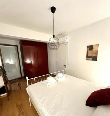 Letto o letti in una camera di Close to the historic center with free parking