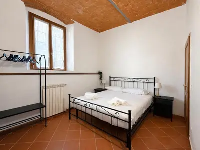 Letto o letti in una camera di Oasis Apartment, Vasca Idromassaggio e Parcheggio