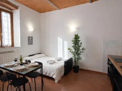 Letto o letti in una camera di Oasis Apartment, Vasca Idromassaggio e Parcheggio