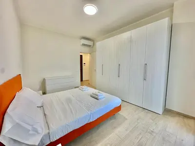Letto o letti in una camera di Luxury house a pochi passi dalla tramvia