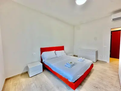 Letto o letti in una camera di Luxury house a pochi passi dalla tramvia
