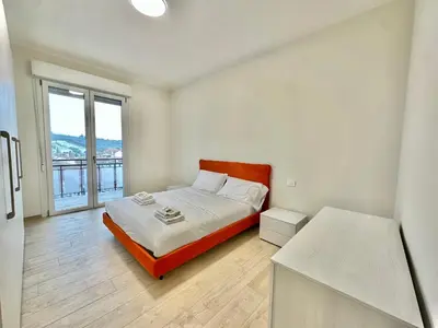 Letto o letti in una camera di Luxury house a pochi passi dalla tramvia