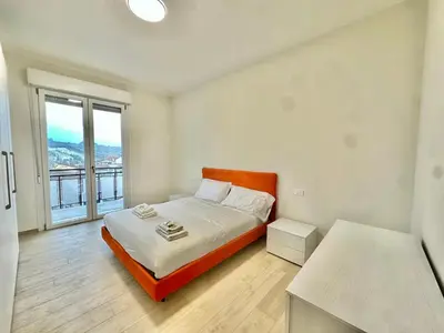 Letto o letti in una camera di Luxury house a pochi passi dalla tramvia