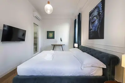 Letto o letti in una camera di Lotus San Frediano by MMega