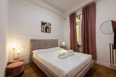 Letto o letti in una camera di Lotus San Frediano by MMega