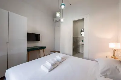 Letto o letti in una camera di Lotus San Frediano by MMega