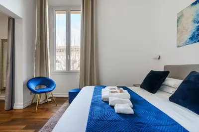 Letto o letti in una camera di Zeus Luxe Home