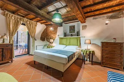 Letto o letti in una camera di Dimora dal fascino storico e autentico
