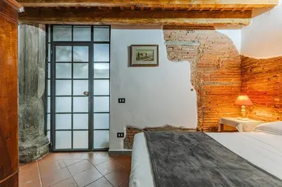 Letto o letti in una camera di Dimora dal fascino storico e autentico