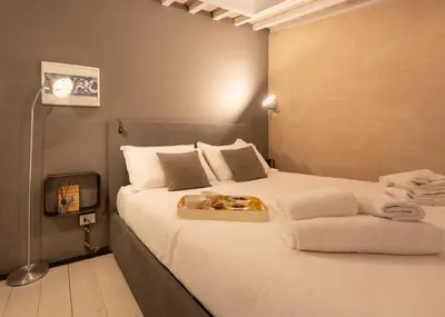 Letto o letti in una camera di San Lorenzo Mezzanine