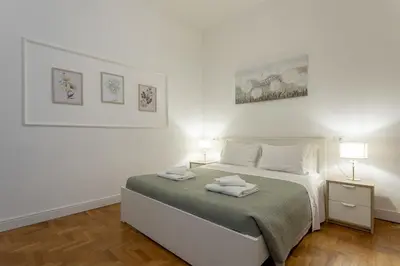 Letto o letti in una camera di Delux Via Faenza
