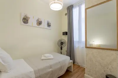 Letto o letti in una camera di Delux Via Faenza