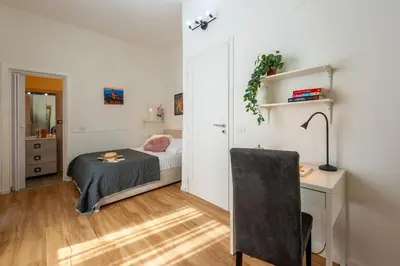 Letto o letti in una camera di Vittoria - Flo Apartments