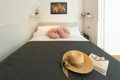 Letto o letti in una camera di Vittoria - Flo Apartments