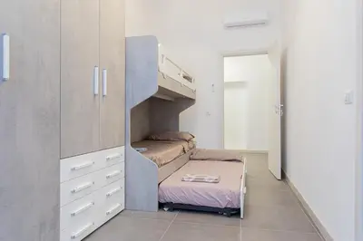 Letto o letti in una camera di Casa Nanuzza