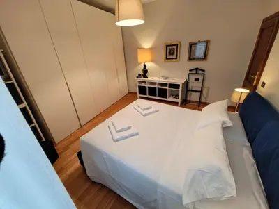 Letto o letti in una camera di Artists' House
