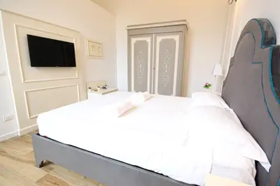 Letto o letti in una camera di Prestige Milton Apartment Florence
