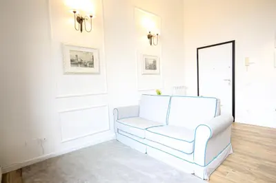 Area soggiorno di Prestige Milton Apartment Florence