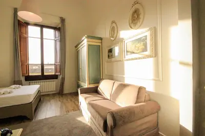 Letto o letti in una camera di Signature Milton Green Apartment Florence