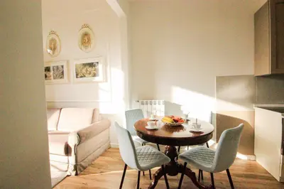 Area soggiorno di Signature Milton Green Apartment Florence
