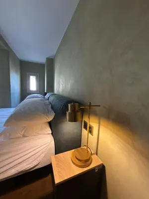 Letto o letti in una camera di Via San Giuseppe 30 ,sul tetto di FIRENZE