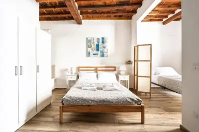 Letto o letti in una camera di Appartamento Palazzuolo By San Firenze Collection