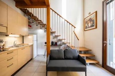 Cucina o angolo cottura di Elegant Loft a due passi dal Centro by Hôtea