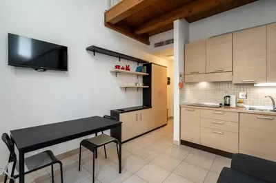 Cucina o angolo cottura di Elegant Loft a due passi dal Centro by Hôtea