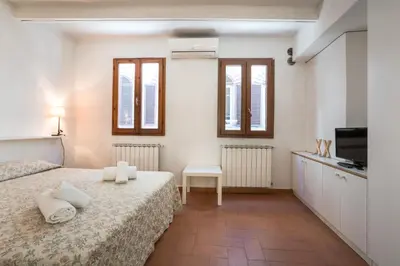 Letto o letti in una camera di Cozy Central Apartment