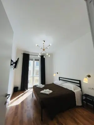 Letto o letti in una camera di Oriani Central Rooms