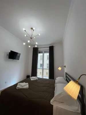 Letto o letti in una camera di Oriani Central Rooms