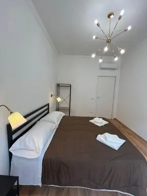 Letto o letti in una camera di Oriani Central Rooms