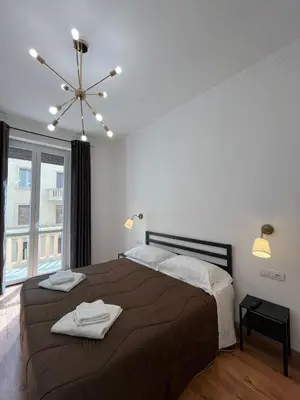 Letto o letti in una camera di Oriani Central Rooms