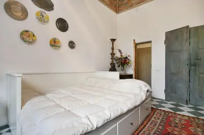 Letto o letti in una camera di Monolocale Splendida Vista