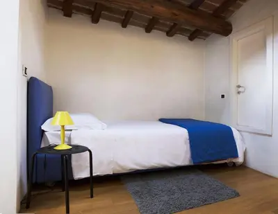 Letto o letti in una camera di Modern Design Apartment in Historic Florence