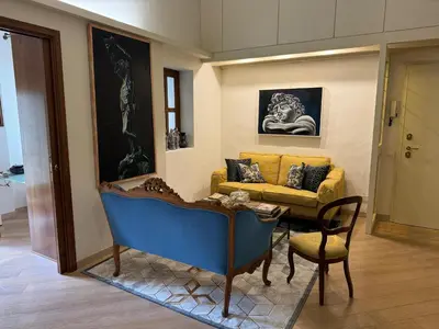 Area soggiorno di Charming Florence Flat San Niccolò 87