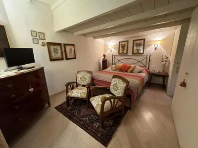 Letto o letti in una camera di Charming Florence Flat San Niccolò 87