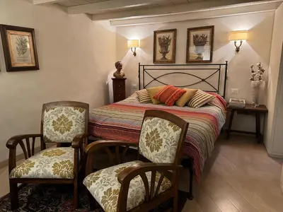Letto o letti in una camera di Charming Florence Flat San Niccolò 87