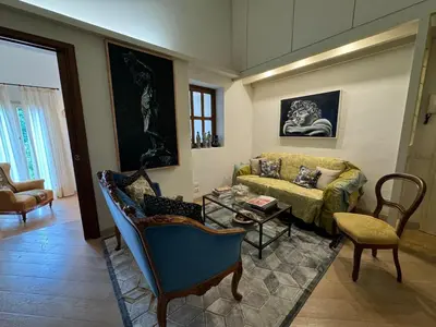 Area soggiorno di Charming Florence Flat San Niccolò 87