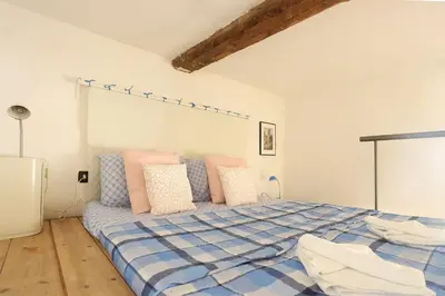 Letto o letti in una camera di Cozy apartment in Santa Croce