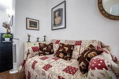 Letto o letti in una camera di Aldobrandini Charming Apartment - Heart of Florence
