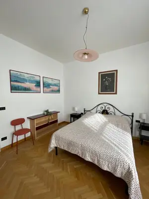 Letto o letti in una camera di Affittacamere Villa Demidoff