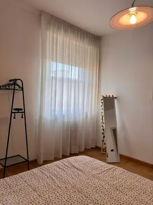 Letto o letti in una camera di Affittacamere Villa Demidoff