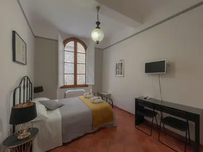 Letto o letti in una camera di Sweet Florence Bargello 3