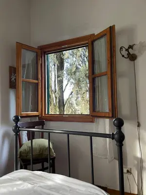 Letto o letti in una camera di Casa per la Pace