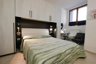 Letto o letti in una camera di Suite dei Vanni con parcheggio privato gratuito