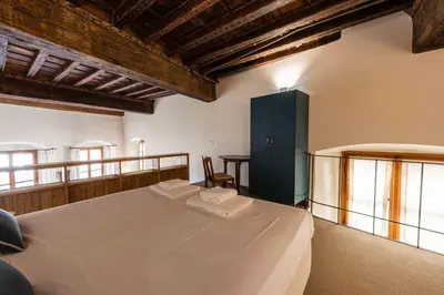 Letto o letti in una camera di Casa Maggio by MMega